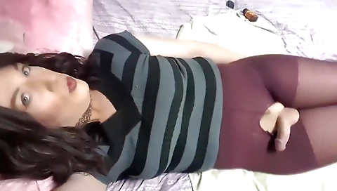 Busty shemale plays with her pussy in front of camera