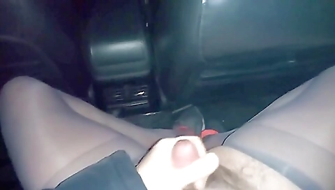 Girl in stockings masturbates in the car in the porn video