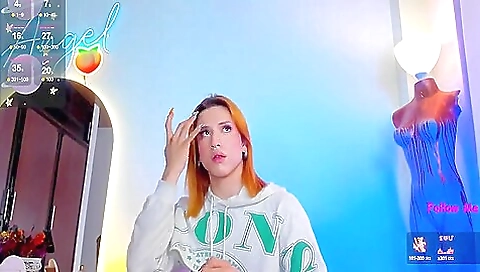 Sexy solo video of a red-haired woman with tattoos