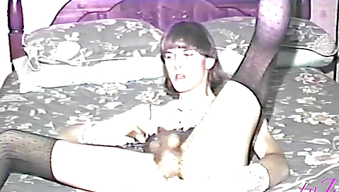 Busty brunette in stockings showing off her hairy bush