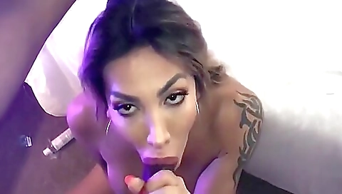 Black and white babe with a tattoo enjoys deepthroating